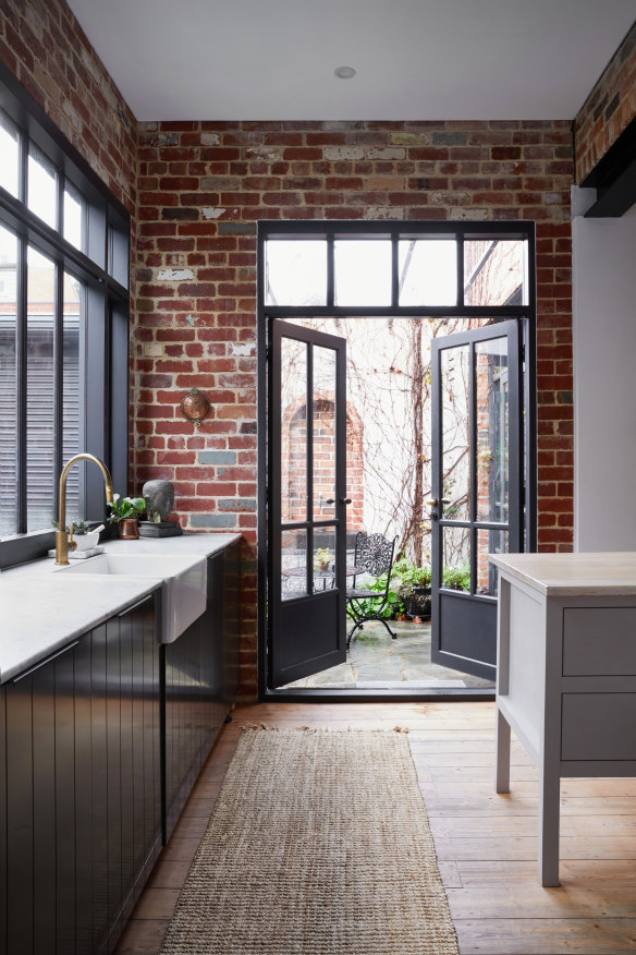 “The kitchen faces north so the windows and French doors capture beautiful light which did not exist at all in the original floorplan,” says Giovannini.