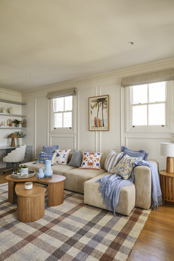 The Adairs modular “Tulsa” lounge upholstered in chunky corduroy creates a relaxed vibe in the upstairs family lounge, which incorporates a home office. 