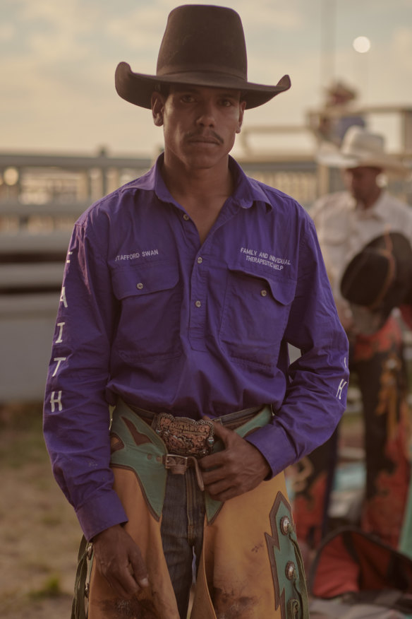 Stafford Swan, a Wanyi man, horse-breaker and devout Christian, prays during competition.