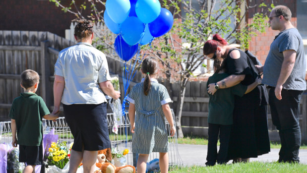 Schoolchildren and parents visited the property on Friday afternoon to pay their respects.