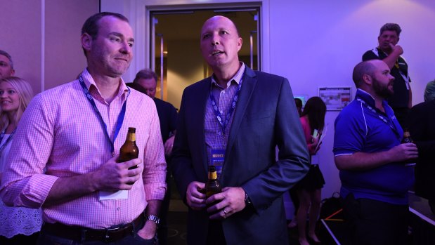 Immigration Minister Peter Dutton is seen at the LNP Election night function in Brisbane.
