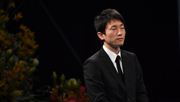 Yosuke Kanno's brother Junpei at Tuesday's memorial service. 