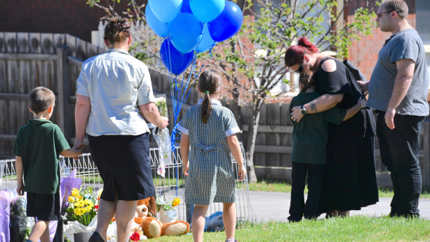 Schoolchildren and parents visited the property on Friday afternoon to pay their respects.