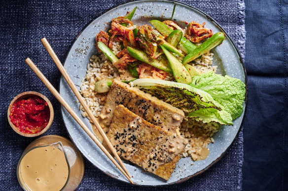 Satay tempeh rice bowls with crunchy kimchi cucumbers. 