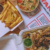 Thai charcoal chicken, chips and salad.