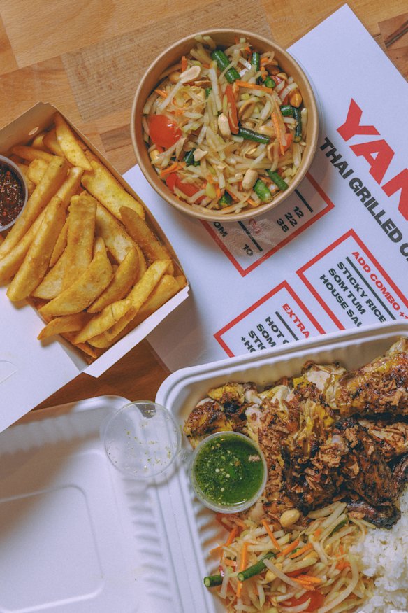 Southern Thai charcoal chicken, salad and chips.