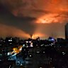 Smoke and flames rising from airstrikes on Tehran on Saturday night (local time).