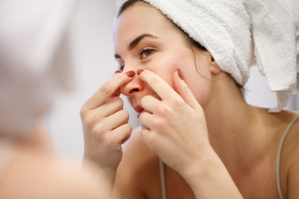 While squeezing blackheads can be satisfying, professional extraction is the safest option.