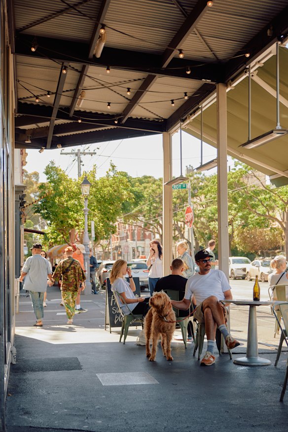 Grab a sunny streetside seat.