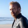 Nicolas Cage is the outsider returning to his childhood home in The Surfer.