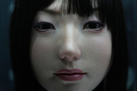 A human-like robot head is displayed at the Humanoid Robots Industry Base on Shougang Park in Beijing.