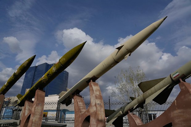 Domestically built Iranian missiles are displayed as part of a permanent exhibition in a recreational area of northern Tehran, Iran, Tuesday, March 24, 2026. (AP Photo/Vahid Salemi)