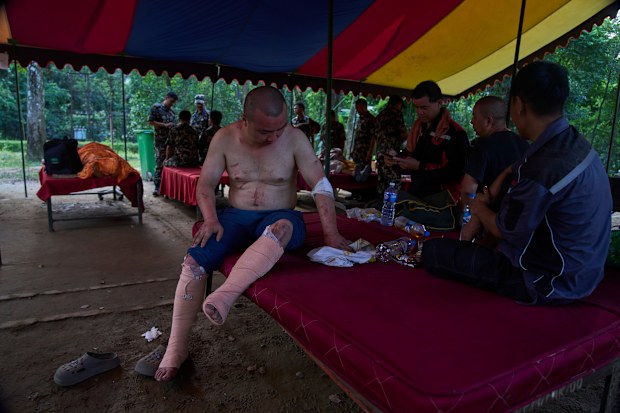 A survived Chinese citizen receive treatment at the army’s Maithali barracks after being rescued from flash flooding in Nuwakot district, Nepal, Thursday, Aug. 27, 2026. 