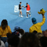 Security ejects unruly spectators from doubles final