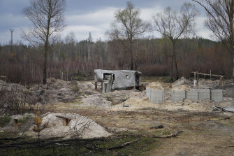 Russian soldiers spent a month hunkered down in trenches in radioactive dirt outside the Chernobyl plant. 