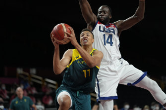 Dante Exum goes to the basket.
