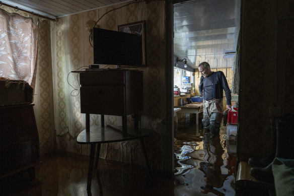 Ihor Medyunov stands in his home near Lysohirka.