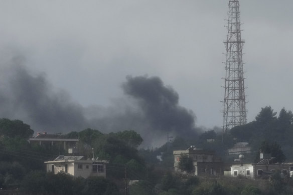 Black smoke rises from an Israeli army position which was hit by Hezbollah heavy missiles.