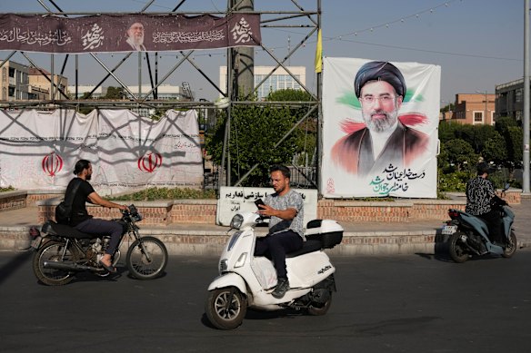 The face of Iran’s new Supreme Leader Mojtaba Khamenei gazes from hundreds of banners on display in Tehran. 