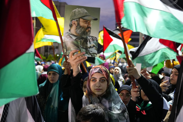 A Hezbollah supporter during a rally in Beirut’s southern suburbs, celebrating the Hamas attacks on Israel.