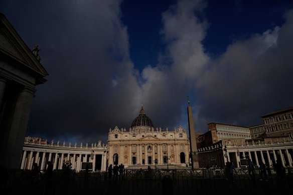 Clouds pass over the St Peter’s Basilica at the Vatican.