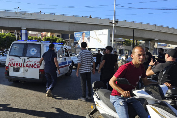 An ambulance carries wounded people in Beirut.