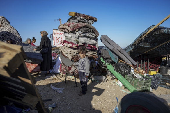 Palestinians arrive in central Gaza after leaving Rafah.