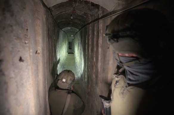 Israeli soldiers show the media a tunnel under Gaza City last month.