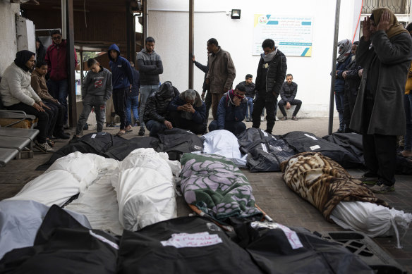 Palestinians mourn relatives killed in the Israeli bombardment in Rafah, Gaza.