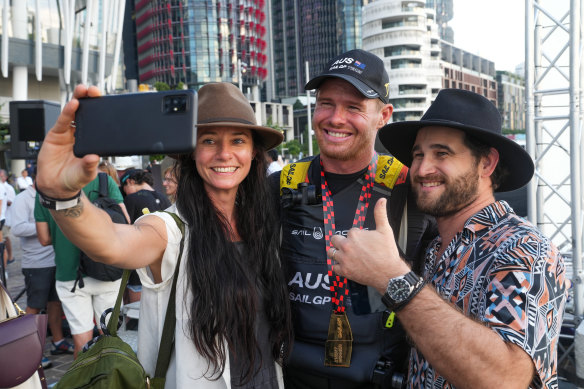 Tom Slingsby with fans at a 2021 SailGP event.