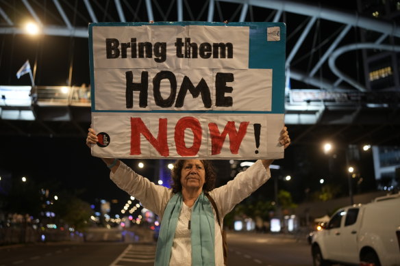 People demonstrate outside the Kyria defence complex in Tel Aviv as Israel’s cabinet meets.