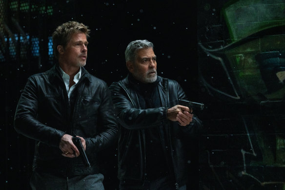 Brad Pitt and George Clooney trade on their ’90s charm as unnamed underworld fixers in Wolfs.