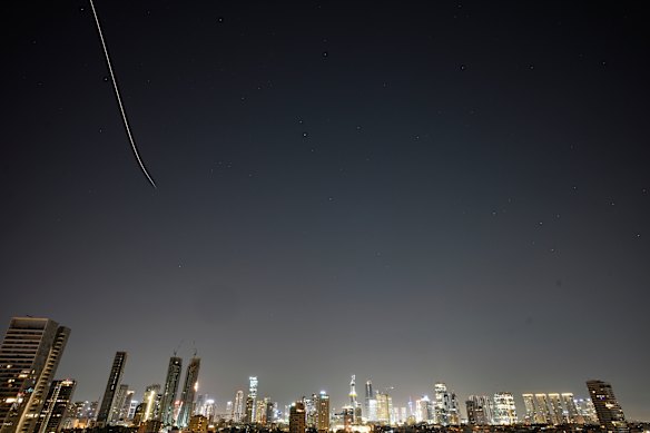 Missiles launched from Iran streak across the sky over central Israel earlier today.