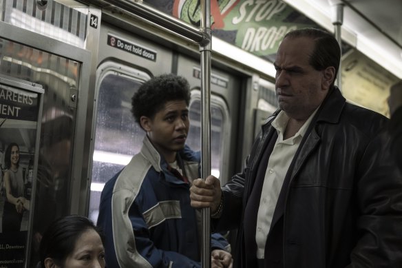 The Penguin (Colin Farrell), right, moulds his young sidekick Victor (Rhenzy Feliz) through both fear and reward. 