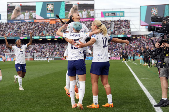 Lindsey Horan celebrates scoring the US’s thrid goal with Megan Rapinoe and Sophia Smith. 