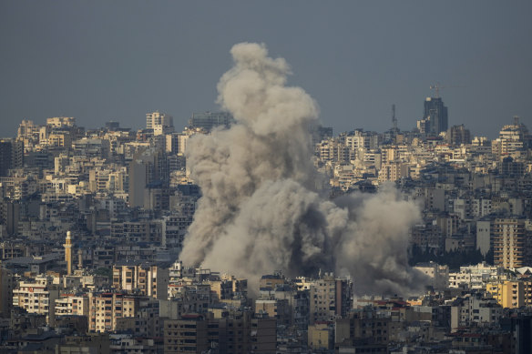 Smoke billows following Israeli airstrikes in Dahiyeh, Beirut, Lebanon on Wednesday.
