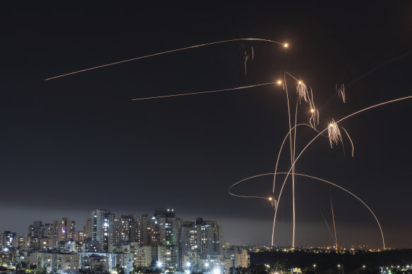 Israel’s Iron Dome missile defence system fires interceptors at rockets launched from the Gaza Strip, in Ashkelon, southern Israel. 