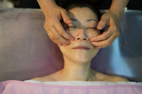 Keiko Kawano receives a specific kind of facial in Seoul, South Korea, that she says will benefit her smiling muscles.