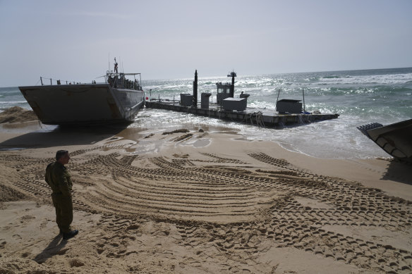 A US Army landing craft is beached in Ashdod, Israel, after being swept from the humanitarian pier.