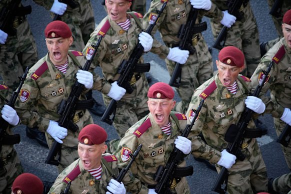 Russian soldiers march towards Red Square to attend a Victory Day military parade in Moscow on Tuesday.