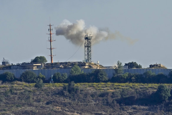 Smoke rises from inside an Israeli army position which was hit by Hezbollah fighters as seen from Tair Harfa, a Lebanese border village with Israel, south Lebanon.