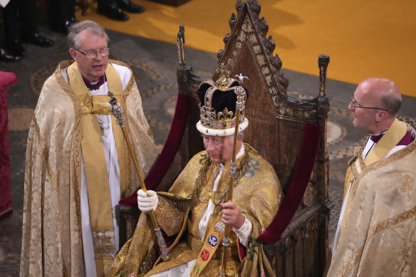 King Charles III looks on after being crowned with St Edward’s Crown.