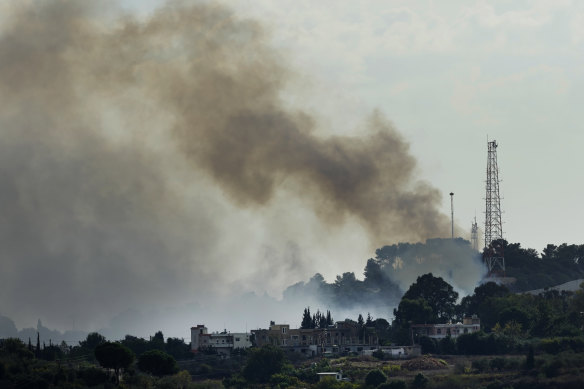 Smoke rises from an Israeli army position which was attacked by Hezbollah fighters near Alma al-Shaab a Lebanese border village with Israel.