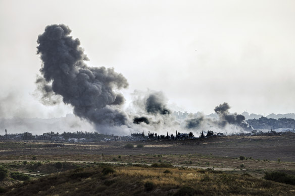 Smoke rises following an Israeli airstrike in the Gaza Strip, as seen from southern Israel.