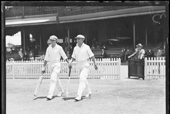 Don Bradman and Stan McCabe going out to bat in 1930. 