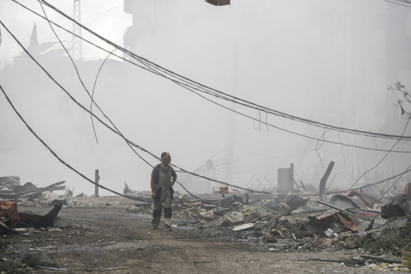 Smoke rises from destroyed buildings at the site of an Israeli airstrike in Choueifat, south east of Beirut, on Monday.