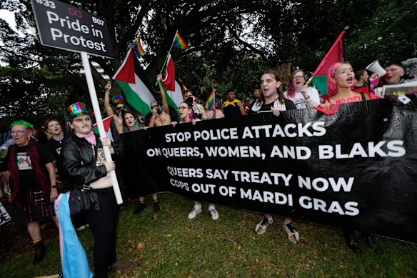 Activist group Pride in Protest carry a banner as 200 floats and thousands of people take part in Sydney’s Mardi Gras parade on March 2, 2024. 