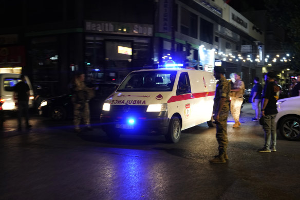 An ambulance carrying people wounded when their handheld pagers exploded arrives at the American University hospital in Beirut, Lebanon.