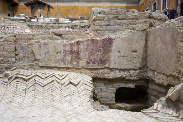 A fresco is seen on a wall after excavation at Nero’s Theatre. The site is due to be reburied when research is completed.
