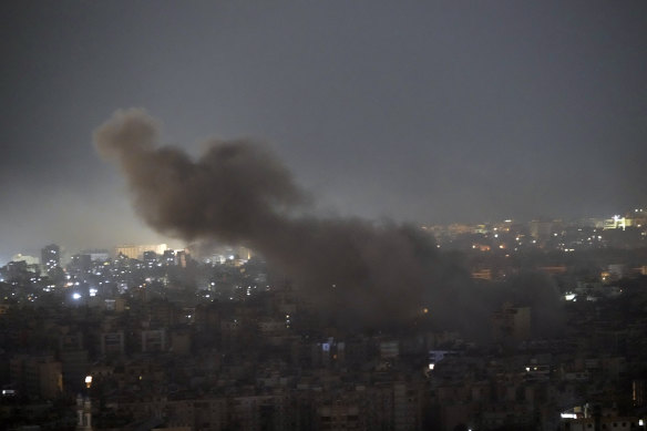 Smoke rises after an Israeli airstrike in Dahiyeh, Beirut.